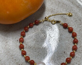 Red Jadeite Pearl Bracelet: Gold-Plated Adjustable Clasp, Freshwater Pearl Accent