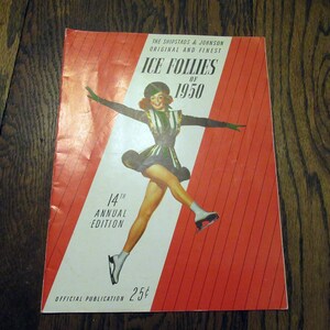 May include: A red and white program cover for the 14th annual Ice Follies of 1950. The cover features a woman in a green and white costume ice skating. The text "The Shipstads & Johnson Original and Finest Ice Follies of 1950" is printed at the top of the cover. The text "14th Annual Edition" is printed in the middle of the cover. The text "Official Publication 25¢" is printed at the bottom of the cover.