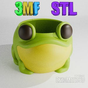 May include: A green frog-shaped planter with a yellow interior. The planter is made of 3D printed plastic and has a smooth, glossy finish. The text "3MF STL" is visible in the background.