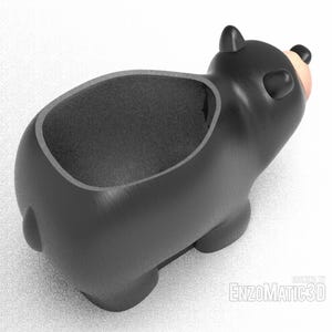 May include: Black bear-shaped planter with a smooth, rounded surface. The planter has a wide opening at the top and a small opening at the bottom for drainage.