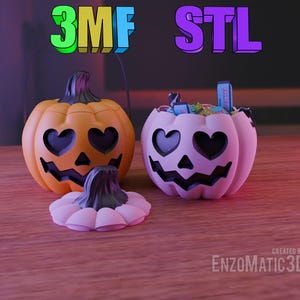 May include: Two 3D printed Halloween pumpkin candy buckets. One is orange with black eyes and a black mouth. The other is pink with black eyes and a black mouth. Both have heart-shaped eyes. The pink bucket has a lid and is filled with candy. The text "3MF STL" is in the background.