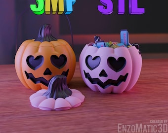 May include: Two 3D printed Halloween pumpkin candy buckets. One is orange with black eyes and a black mouth. The other is pink with black eyes and a black mouth. Both have heart-shaped eyes. The pink bucket has a lid and is filled with candy. The text "3MF STL" is in the background.