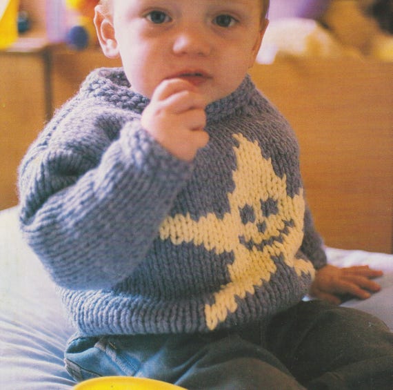 Starburst Jumper, Snowflake Jacket, Striped Onesie, Blanket, and Bear.