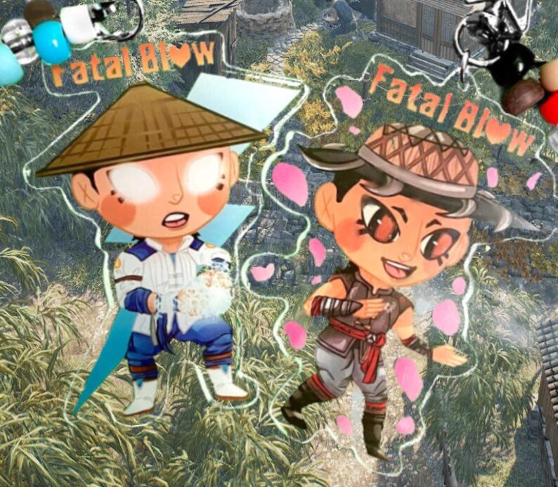 May include: Two anime-style character charms with the text "Fatal Blow" on each. The charm on the left features a character with a white and blue outfit, a brown hat, and a white and blue background. The charm on the right features a character with a red and black outfit, a brown hat, and a pink and white background.