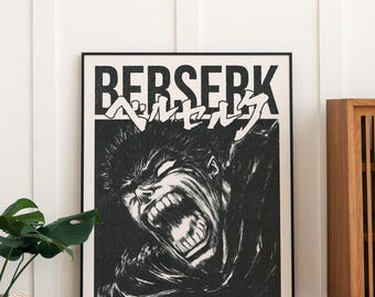 May include: Black and white poster featuring the word "BERSERK" in bold, stylized lettering, with Japanese characters above. The poster depicts a detailed illustration of a character with an open mouth and intense expression. The poster is framed.