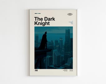 May include: Framed poster featuring the title "The Dark Knight" in bold black font above a teal image of Batman overlooking a cityscape. The poster has a cream-colored background with additional text and a circular design.