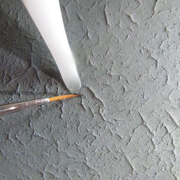 Delrin microspatula for paint consolidation