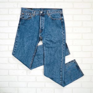 Jeans Levi's 501 vintage clásicos de lavado claro con cierre de botones / talla 34 x 34