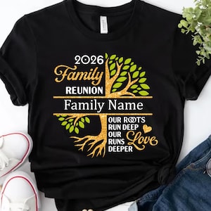 May include: Black t-shirt with a gold and green tree design. The text reads "2026 Family Reunion" above "Family Name". Below the tree, it says "Our Roots Run Deep, Our Runs Deeper Love".