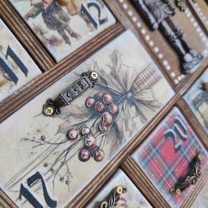 May include: A wooden advent calendar with multiple drawers featuring festive imagery. One drawer displays the number 17, a sprig of holly with red berries, and a metal handle. Another drawer shows the number 20 over a red plaid pattern.