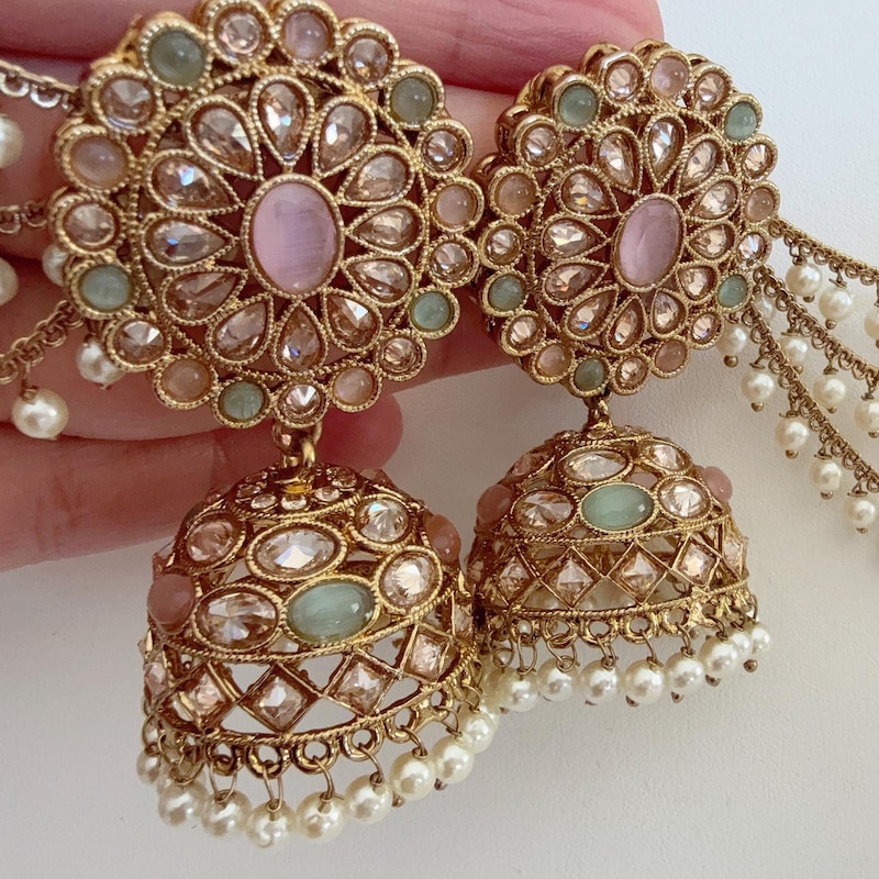 mint green and black jordans