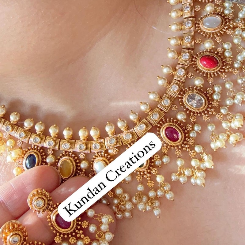 Gold Navratan Cuff Bracelet With Multi Stone Highlights main image 0