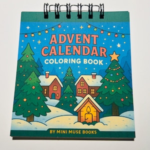 May include: A spiral-bound Advent Calendar Coloring Book with a festive winter scene. The cover features a blue background with a Christmas tree, houses, and the text "Advent Calendar Coloring Book". The book is by Mini Muse Books.