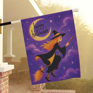May include: A rectangular garden flag featuring a witch with long orange hair flying on a broomstick against a purple cloudy sky. A large yellow crescent moon is in the upper left corner with the text happy halloween written in black script.