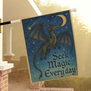 May include: A rectangular flag with a blue background featuring a green dragon, crescent moon, and stars. The flag reads "Seek Magic Everyday" in a decorative font. The flag is mounted on a white pole.
