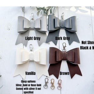 purse charm, bow, bag accessories, coquette, leather bow, handmade leather bow, leather bow purse charm, bow bag charm, leather bag charm, purse charm bow, bow handbag charm, bow keychain charm, purse accessory, handbag charm, cute bag charm, monogram bag charm, custom name keychain, genuine leather, genuine leather bow, genuine leather purse charm, speedy bag charm, coquette, bag bling, purse tassels