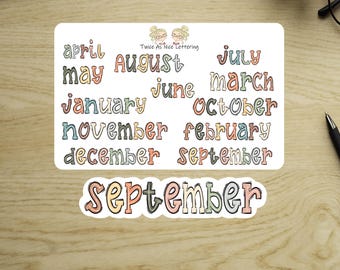 May include: A sticker sheet featuring the months of the year in colorful, handwritten lettering. The word "September" is also displayed on a separate sticker. The design includes the text "Twice As Nice Lettering".