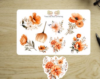 May include: A sheet of floral stickers featuring orange and white watercolor flowers and greenery. The stickers include various flower arrangements and individual blooms. The text "Twice As Nice Lettering" is printed on the sheet.