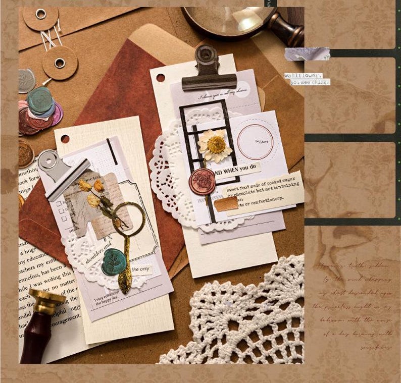 May include: A vintage-themed scrapbook layout with various elements. Includes paper ephemera, dried flowers, a magnifying glass, a wax seal, and decorative paper clips. The color palette is warm, featuring browns, creams, and touches of gold.