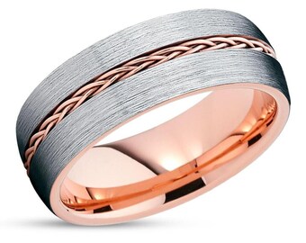 May include: A brushed silver wedding band with a rose gold braided inlay.