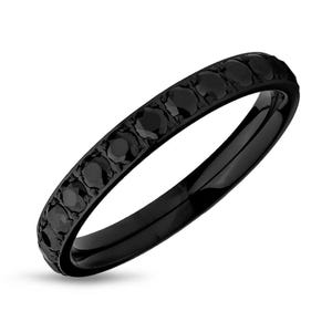 May include: Black ring with a row of small black gemstones around the band.