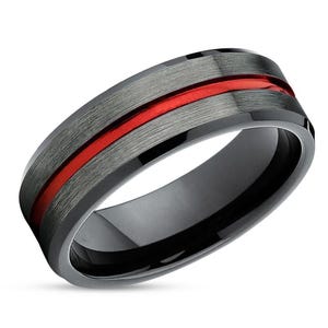 May include: A black tungsten carbide ring with a brushed finish and a red inlay.