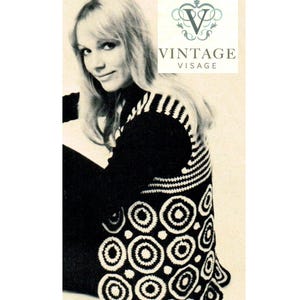 May include: Black and white vintage 1960s Mod Target Top. The top features a black base with white circular and striped patterns. The image includes the text "Vintage Visage Patterns" and "1960s Mod Target Top".