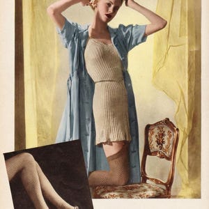 May include: Vintage advertisement featuring a woman in a knitted beige slip dress and a light blue robe. She is kneeling on a decorative chair, wearing a knee-high stocking. The image includes a smaller inset showing legs in fishnet stockings. Text: "If you grudge spending coupons on underwear and stockings, spend a little time instead and make your own, in slim ribs and smart mesh."