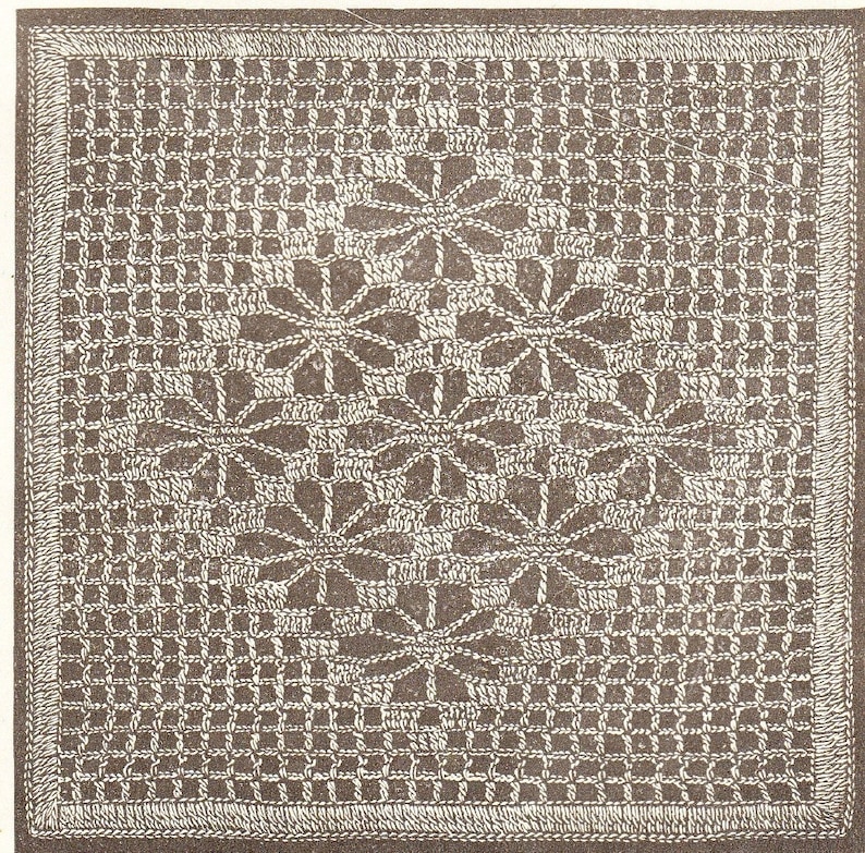 May include: A square, off-white crocheted doily with a detailed floral pattern in the center. The design features a grid-like border and a series of floral motifs. The piece is likely handmade and suitable for home decor.