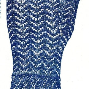 May include: A single, dark blue fingerless glove with a delicate, openwork chevron pattern. The glove is made of a knitted material and has a scalloped edge at the wrist. The design is intricate and visually appealing.
