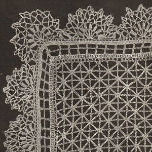 May include: A close-up of a white crocheted doily with a square center and a decorative border. The doily is made with a delicate, intricate pattern.
