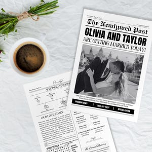 A custom wedding newspaper is displayed on a table with a coffee and flowers. The back page is shown with an inforgraphic timeline of the wedding day, the love story of the couple, and a wedding themed word search.