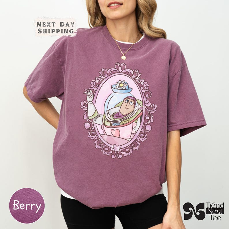 a woman wearing a purple shirt and black shorts