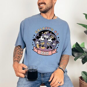 Disney Dad Comfort Colors Shirt, Galaxy’s #1 Dad Tee With Mickey Minnie Design, Magical Father’s Day Gift, Family Vacation Shirt For Dad
