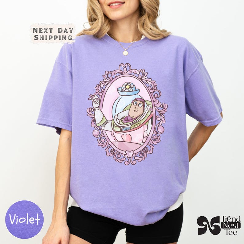 a woman wearing a purple shirt and black shorts