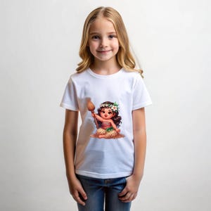 May include: White t-shirt with a cartoon image of a young girl wearing a flower crown and holding a wooden stick. The girl is wearing a brown and green skirt and is sitting on a pile of brown grass.