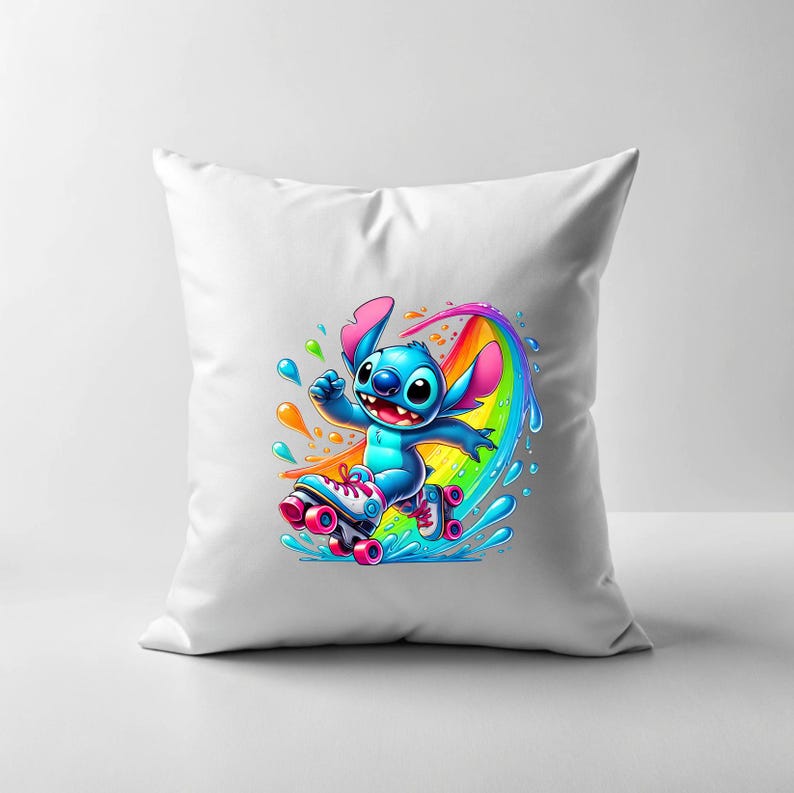May include: A white pillow featuring a blue Stitch character on roller skates. Stitch is skating on a rainbow with water splashing around him.