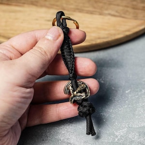 Paracord Keychain with Alien Bead, Tactical Lanyard, Survival Gear, Handmade Rope Fob, Black Paracord Charm, Sci-Fi Gift for Him or Her