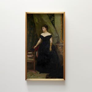 May include: A framed painting of a woman in a black gown with a sweetheart neckline and long gloves. The painting has a gold frame and is set against a backdrop of draped fabric and ornate furniture. The woman is standing near a small table.