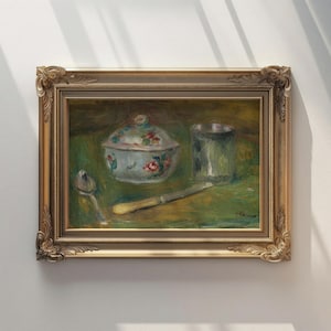 May include: A framed painting of a still life featuring a white porcelain bowl with floral designs, a silver spoon, a knife, and a glass tumbler on a green background.