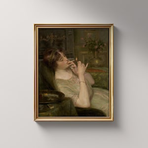 May include: A painting of a woman in a green dress, sitting on a couch, lighting a cigarette. The woman is looking to the side and has a thoughtful expression on her face. The painting is set in a dimly lit room with a vase of flowers in the background.