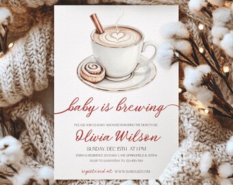 May include: A baby shower invitation with a watercolor illustration of a coffee cup with a heart-shaped design in the foam, a cinnamon stick, and a pastry. The invitation text reads "baby is brewing" and includes event details.
