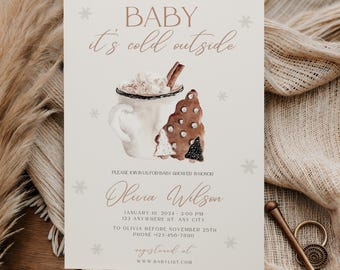 May include: A baby shower invitation with a watercolour illustration. The design features a mug of hot chocolate with whipped cream and a gingerbread cookie. The text reads "BABY it's cold outside" and includes event details.