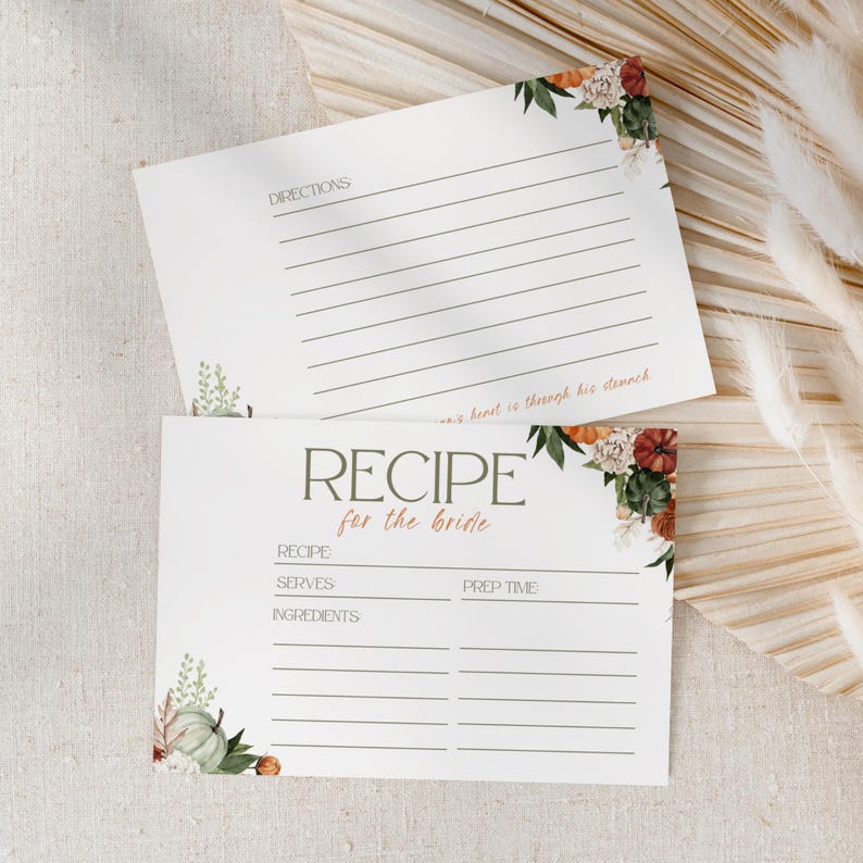 May include: Two white recipe cards with fall-themed floral accents. The top card reads "Directions" and includes lines for writing. The bottom card says "Recipe for the bride" with spaces for recipe details.