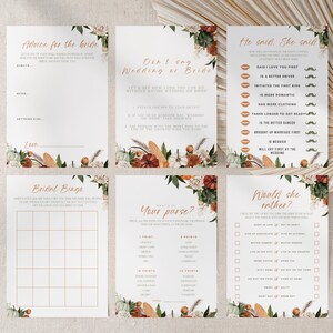 May include: A collection of six printable bridal shower games on white cardstock. The games include "Advice for the Bride," "Don't Say Wedding or Bride," "He Said, She Said," "Bridal Bingo," "What's in Your Purse?" and "Would She Rather?" Each card has a floral design.