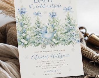 May include: Baby shower invitation with a winter theme. The invitation features a baby carriage, blue floral arrangements, and the text "Baby it's cold outside." The invitation is for Olivia Wilson.