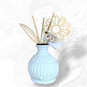 Difusor de fragancia en cristal blanco, bombonera completa con estuche, cinta, confeti, tarjeta personalizada y fragancia.