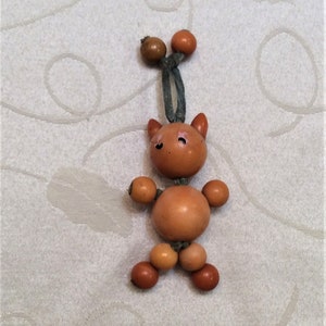 Vintage Bakelite Crib Toy Cat 1930&#39;s Original Butterscotch Beads and String