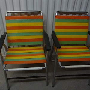 Vintage pair vinyl/rubber strap folding aluminum base lawn chairs/set of 2/Yellow-Orange-Green/70's beach chair/poolside/lakeside/firepit