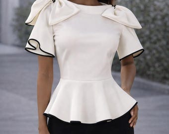 Bow La La-blouse - kenmerkende peplumtop
